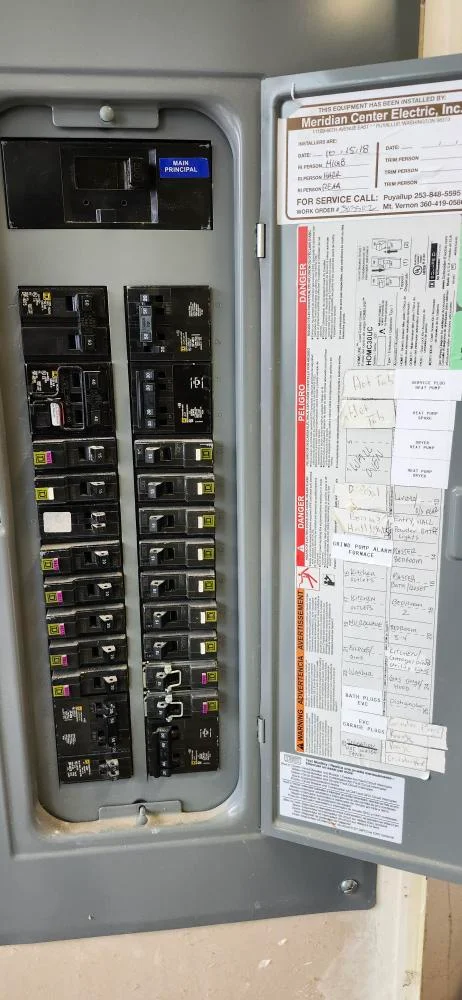 New circuit breaker in the main electrical panel for a heat pump in Lake Forest Park, WA