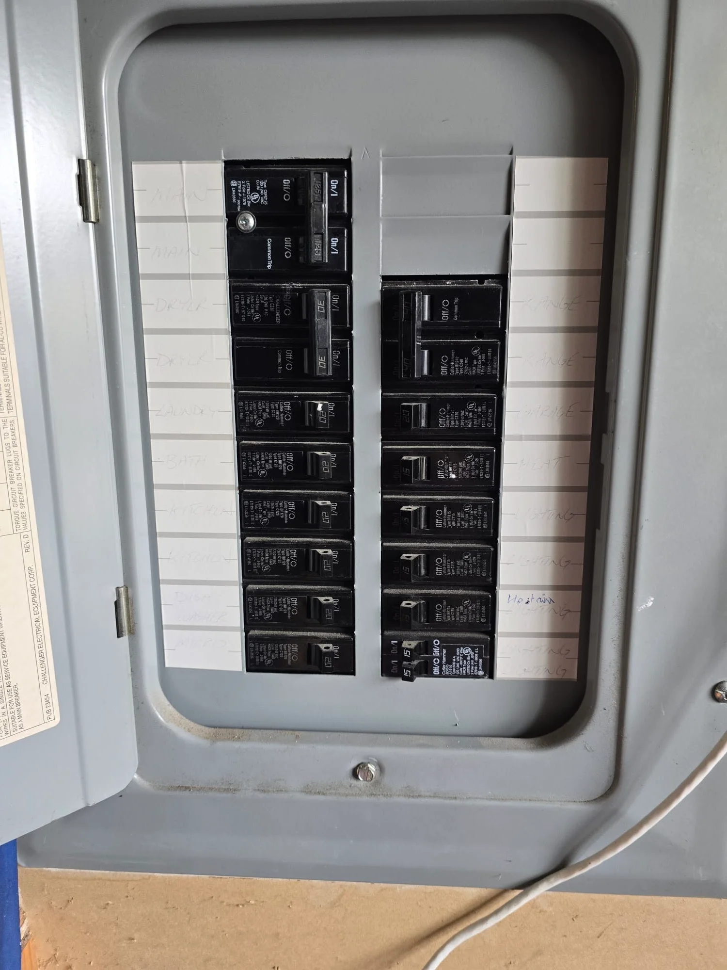 Residential electrical panel with labeled breakers during an electrical repair in Marysville, WA