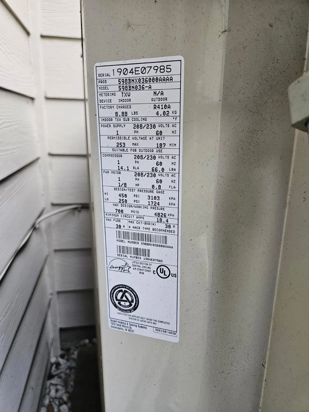 Bryant outdoor AC data plate documenting the equipment in the Mukilteo maintenance case.