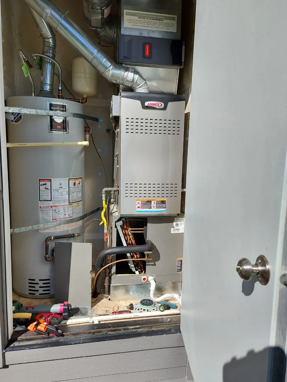 Existing Lennox gas furnace and evaporator coil in the Snoqualmie HVAC replacement project.