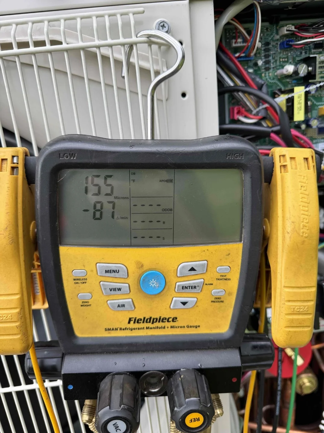 Digital gauge measurements during heat pump commissioning in Arlington