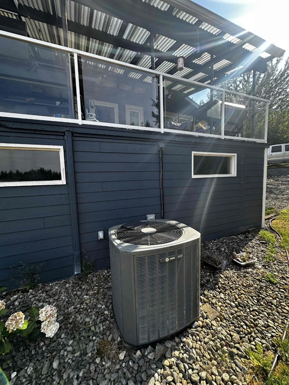 Original outdoor unit beside the Arlington home