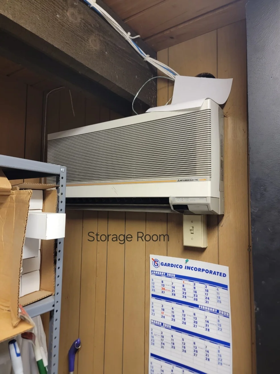 Older Mitsubishi Electric ductless mini-split in the storage room in Woodinville, WA