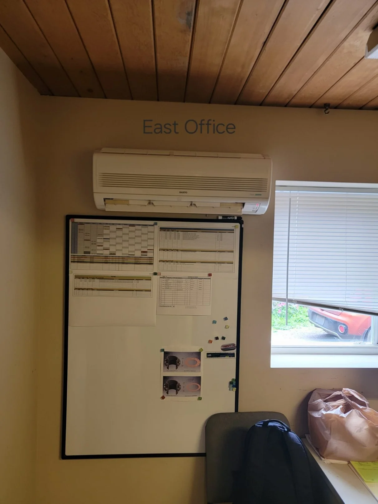 Older Sanyo ductless mini-split in the east office before maintenance in Woodinville, WA