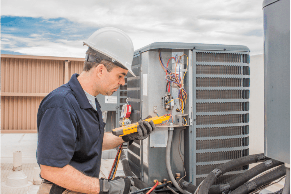 A technician performs a pre-winter HVAC checkup, ensuring optimal performance for the season.